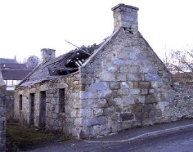 One of the earliest houses.  See where the roof was heightened.
