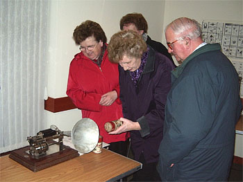 Members study the workings of the graphophone
